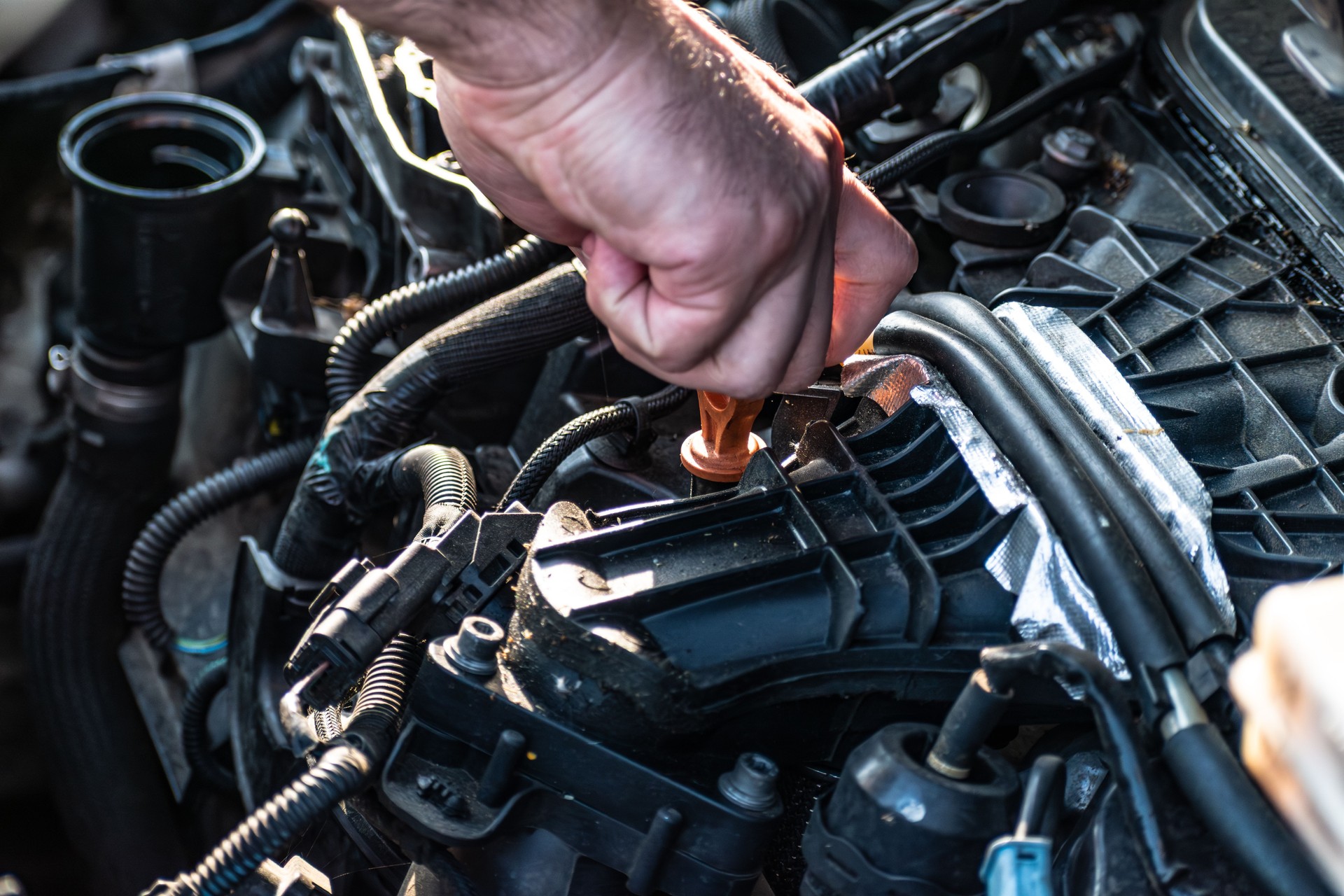 Engine oil check before car journey for safety travel